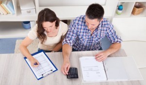 Couple Calculating Bills