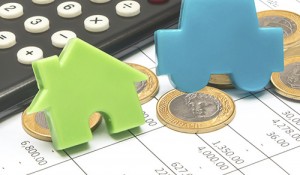 blue car and green house over document