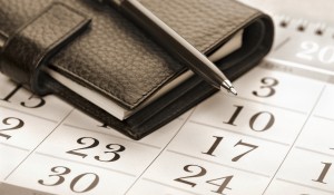 Calendar page, pen and pocket planner