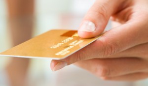 credit_card_in_hand-0d2423c8ef8c1b4ae469a0dd18b9973f