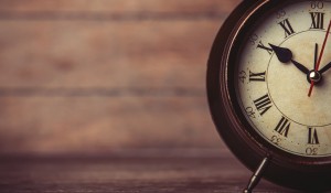Retro Alarm Clock On A Table.
