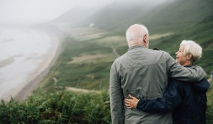 happy-senior-couple-enjoying-a-breathtaking-view_53876-63334