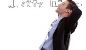 Young business man looking up and planning with  lovely family