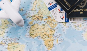 toy-airplane-passports-baggage-allowances-map_23-2147958210