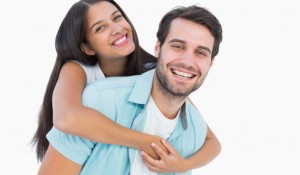 happy-casual-man-giving-pretty-girlfriend-piggy-back_13339-76141