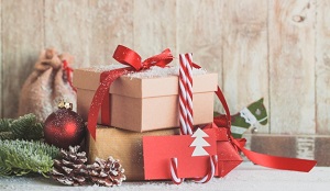 candy-canes-with-red-envelopes-and-gifts_23-2147587149